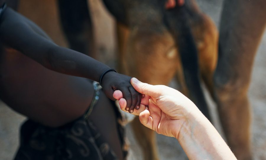 touching-hands-greetings-gesture-tourists-is-in-namibia-with-african-kids.jpg